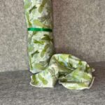 Muss Busters reusable towel roll and loose towel in green dragonfly print with green ribbon